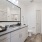 large vanity counter with sink in bathroom