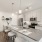 spacious kitchen island with stools