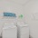 laundry room with lighting and shelves