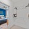 bright walk-in closet in bedroom